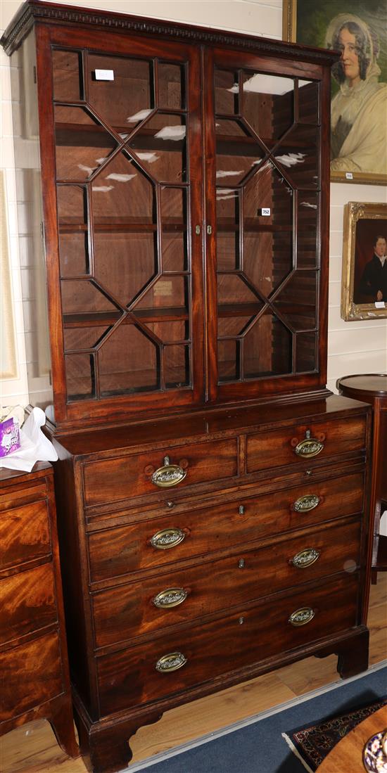 A George III mahogany bookcase cabinet, H.210cm